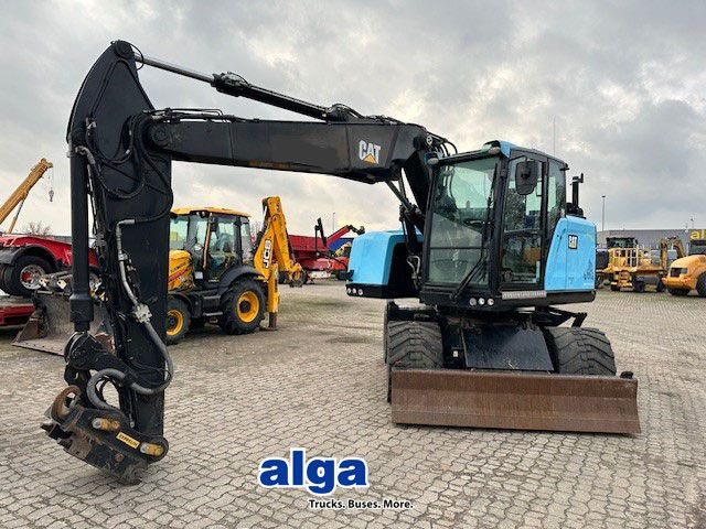 CAT M315F, OilQuick, Hammer- u- Greifersteuerung - Wheel excavator: picture 1 CAT M315F, OilQuick, Hammer- u- Greifersteuerung - Wheel excavator: picture 1