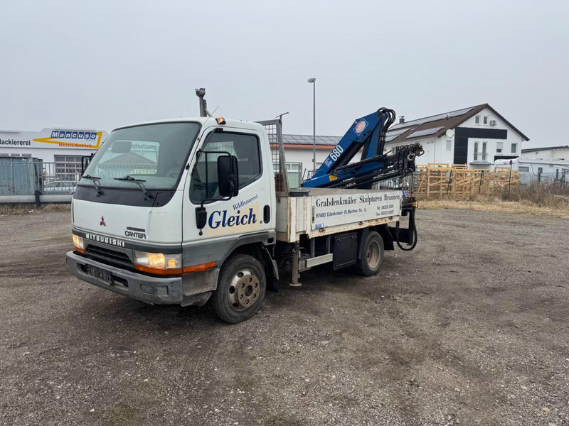 Mitsubishi Canter FE649 - Flatbed truck + crane - Dropside/ Flatbed truck, Crane truck: picture 1 Mitsubishi Canter FE649 - Flatbed truck + crane - Dropside/ Flatbed truck, Crane truck: picture 1