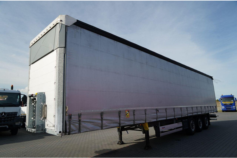 Schmitz Cargobull FIRANKA / STANDARD / OŚ PODNOSZONA / DACH PODNOSZONY - Curtainsider semi-trailer: picture 4 Schmitz Cargobull FIRANKA / STANDARD / OŚ PODNOSZONA / DACH PODNOSZONY - Curtainsider semi-trailer: picture 4