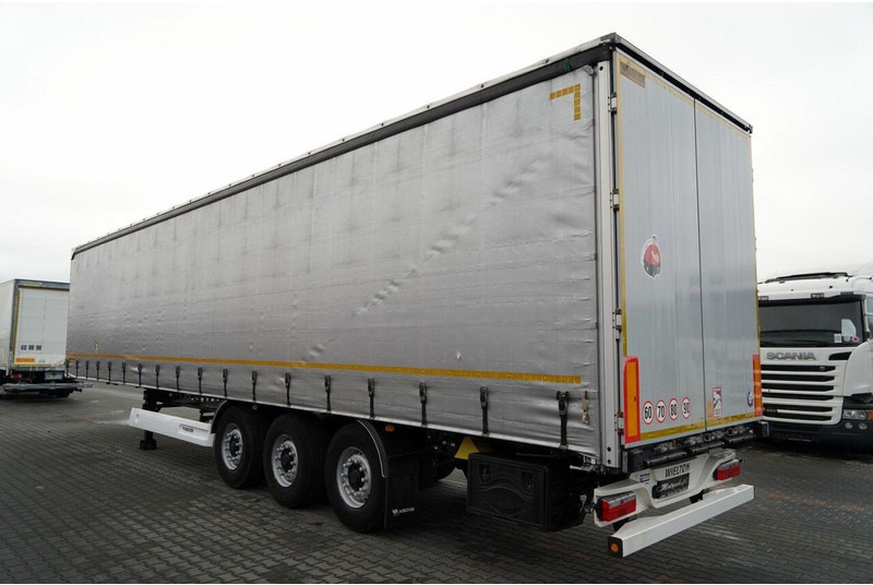 Wielton FIRANKA / STANDARD / OŚ PODNOSZONA / PLANDEKA ZBROJONA - Curtainsider semi-trailer: picture 5 Wielton FIRANKA / STANDARD / OŚ PODNOSZONA / PLANDEKA ZBROJONA - Curtainsider semi-trailer: picture 5