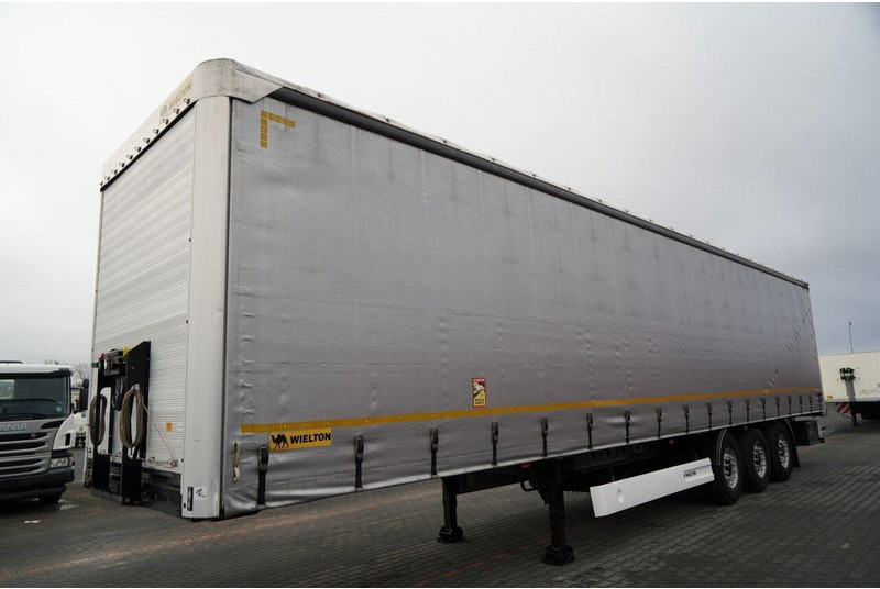 Wielton FIRANKA / STANDARD / OŚ PODNOSZONA / PLANDEKA ZBROJONA - Curtainsider semi-trailer: picture 4 Wielton FIRANKA / STANDARD / OŚ PODNOSZONA / PLANDEKA ZBROJONA - Curtainsider semi-trailer: picture 4