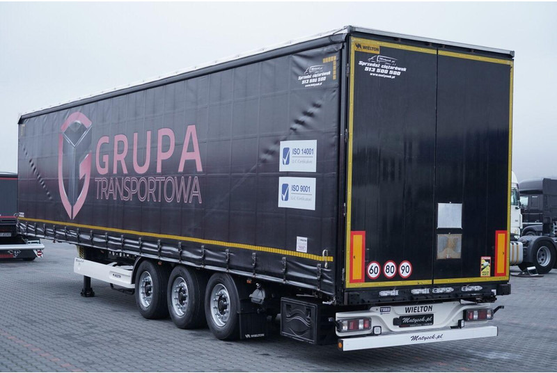 Wielton FIRANKA / VARIOS / 2x OŚ PODNOSZONA / - Curtainsider semi-trailer: picture 4 Wielton FIRANKA / VARIOS / 2x OŚ PODNOSZONA / - Curtainsider semi-trailer: picture 4