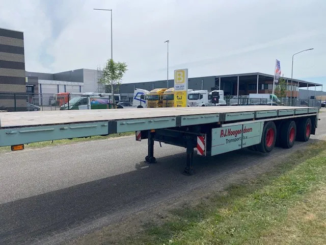 Floor robuuste vlakke oplegger ,uitschuifbaar, ,stuurassen, 20 mtr met stalen bodem/frame. kranenprofiel. - Dropside/ Flatbed semi-trailer: picture 1 Floor robuuste vlakke oplegger ,uitschuifbaar, ,stuurassen, 20 mtr met stalen bodem/frame. kranenprofiel. - Dropside/ Flatbed semi-trailer: picture 1